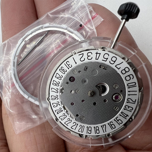 Miyota Citizen 9019 automatic mechanical movement with date at 3 and 6 o'clock positions.