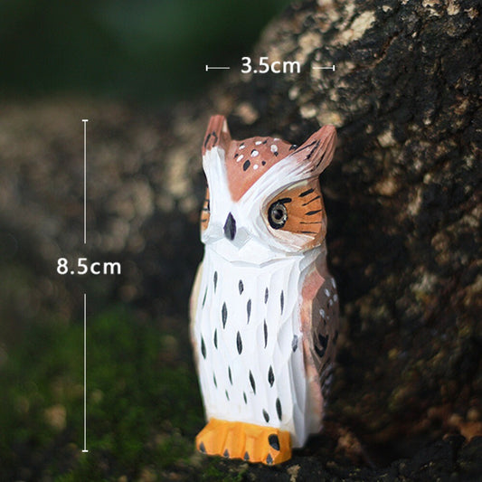 Handcrafted light brown owl sculpture carved from wood, perfect handmade decorative artwork.