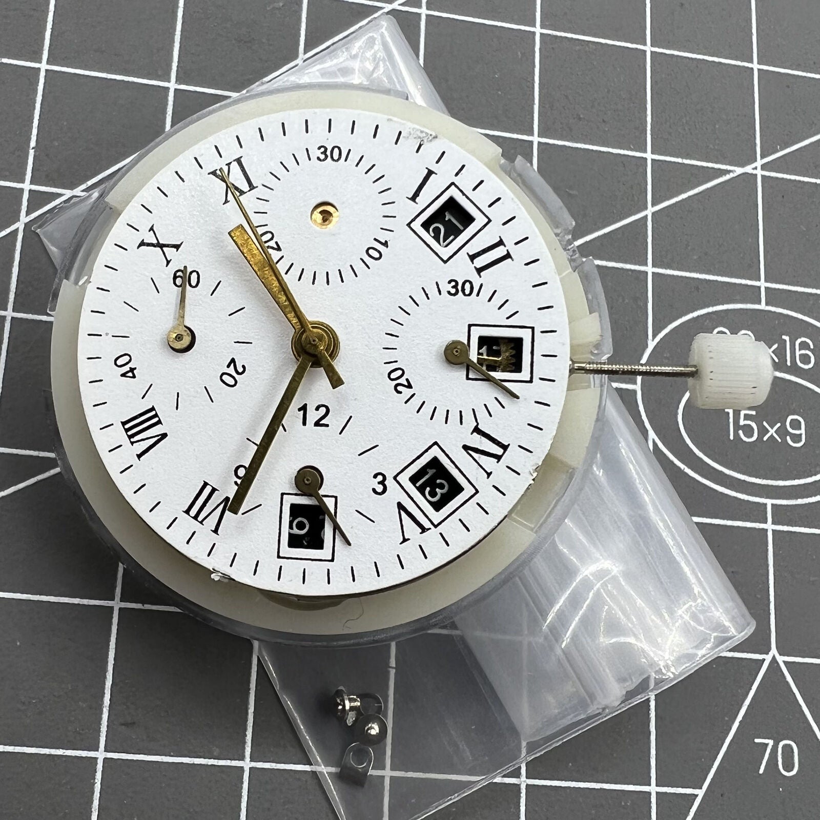 Automatic chronograph watch with ETA 7750 movement, black dial, calendar at 4:30, seconds at 9, precision timing.