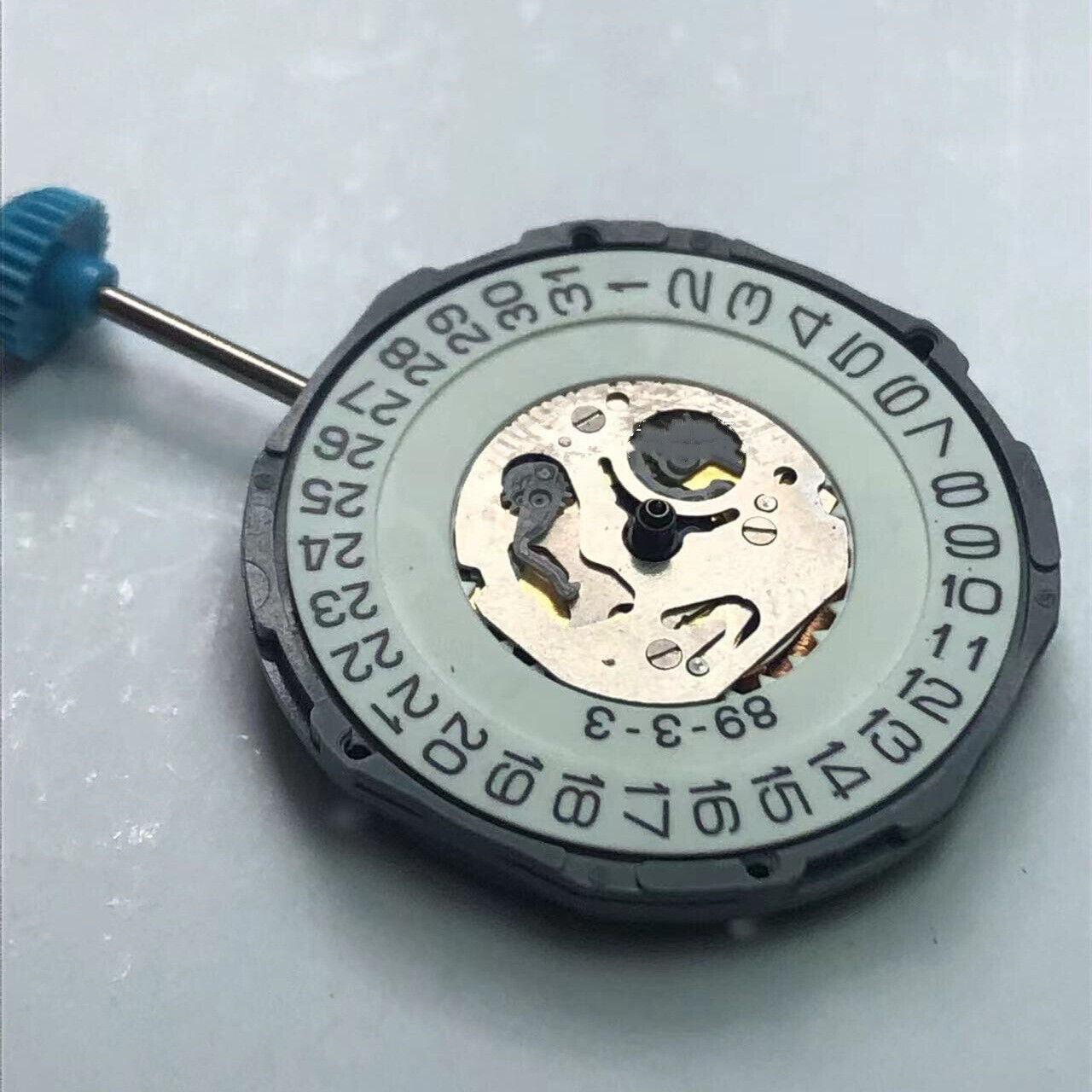Miyota 6M12 quartz watch movement with date at 3 o'clock, precision Japanese craftsmanship.