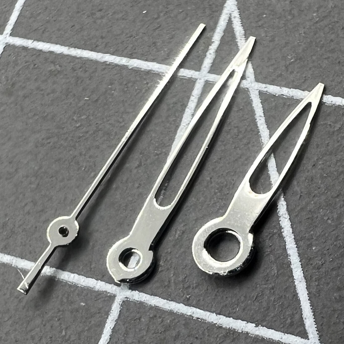 Hollow arrow-shaped watch hands for Miyota 2035 quartz movement, precise and stylish design by P1-H3-C25.