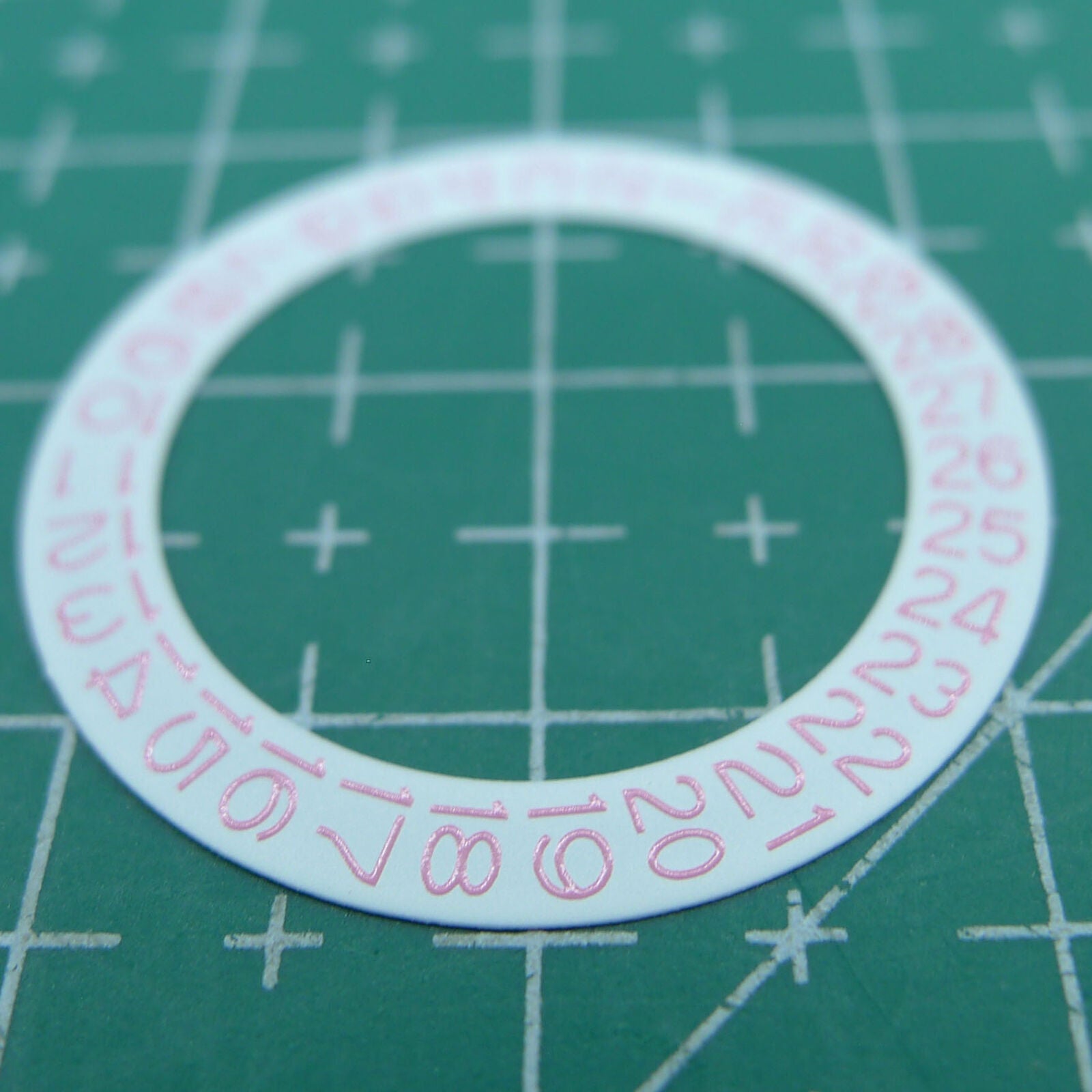 Pink character date wheel for NH35 NH36 watch movements, wholesale on white background.