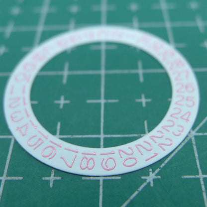 Pink character date wheel for NH35 NH36 watch movements, wholesale on white background.