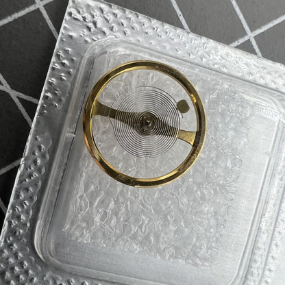 Golden balance wheel with splint for Miyota NH38 NH39 watch movement, perfect for precise timekeeping.