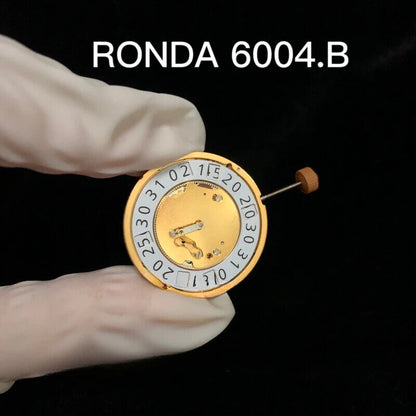 Gold gilted RONDA 6004B Swiss quartz watch movement for precise timekeeping.