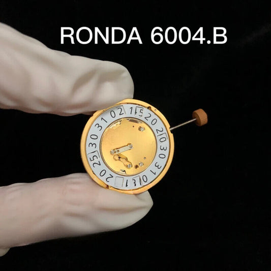 Gold gilted RONDA 6004B Swiss quartz watch movement for precise timekeeping.