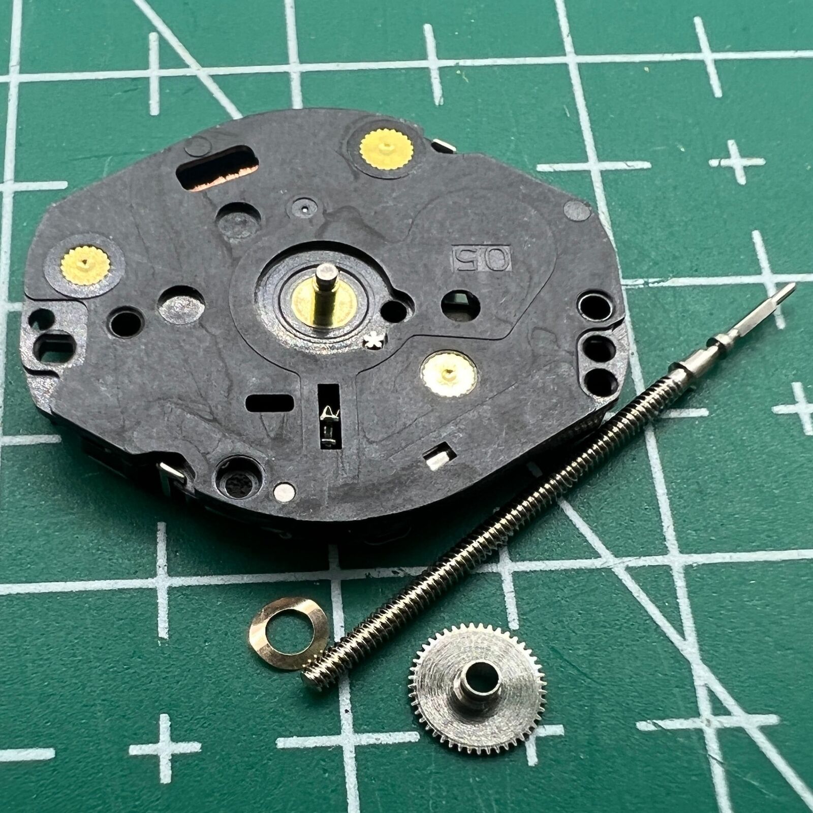 Hattori Epson VX50 quartz watch movement, Japan-made, precise timing for repair enthusiasts.