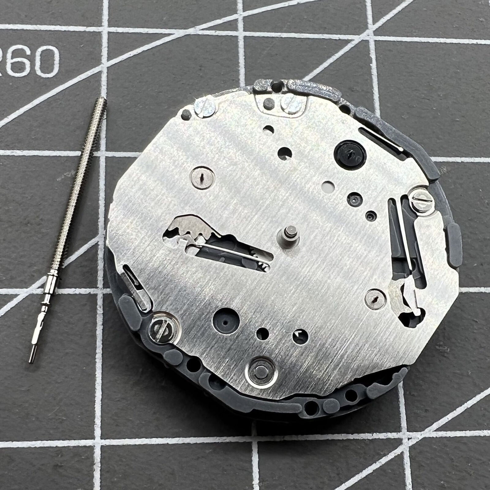 Hattori Epson TMI VD75 quartz watch movement, Japan-made, ideal for precise watch accessory repairs.