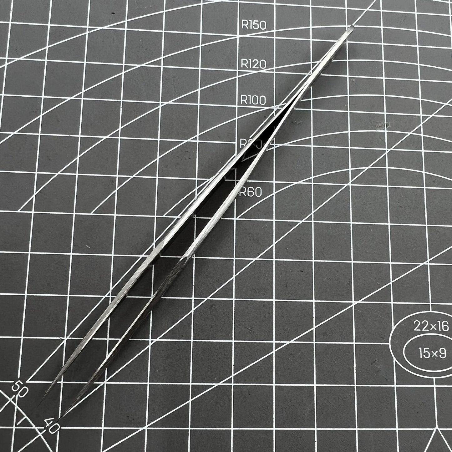 Swiss Horotec MSA12.302-3 antimagnetic fine tweezers for precise watch hairspring handling and repairs.