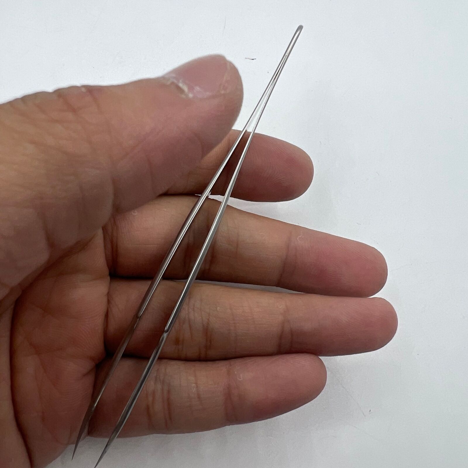 Swiss Bergeon 7026-7 fine curved tweezers, 110mm size L, antimagnetic for precise watch repair tasks.