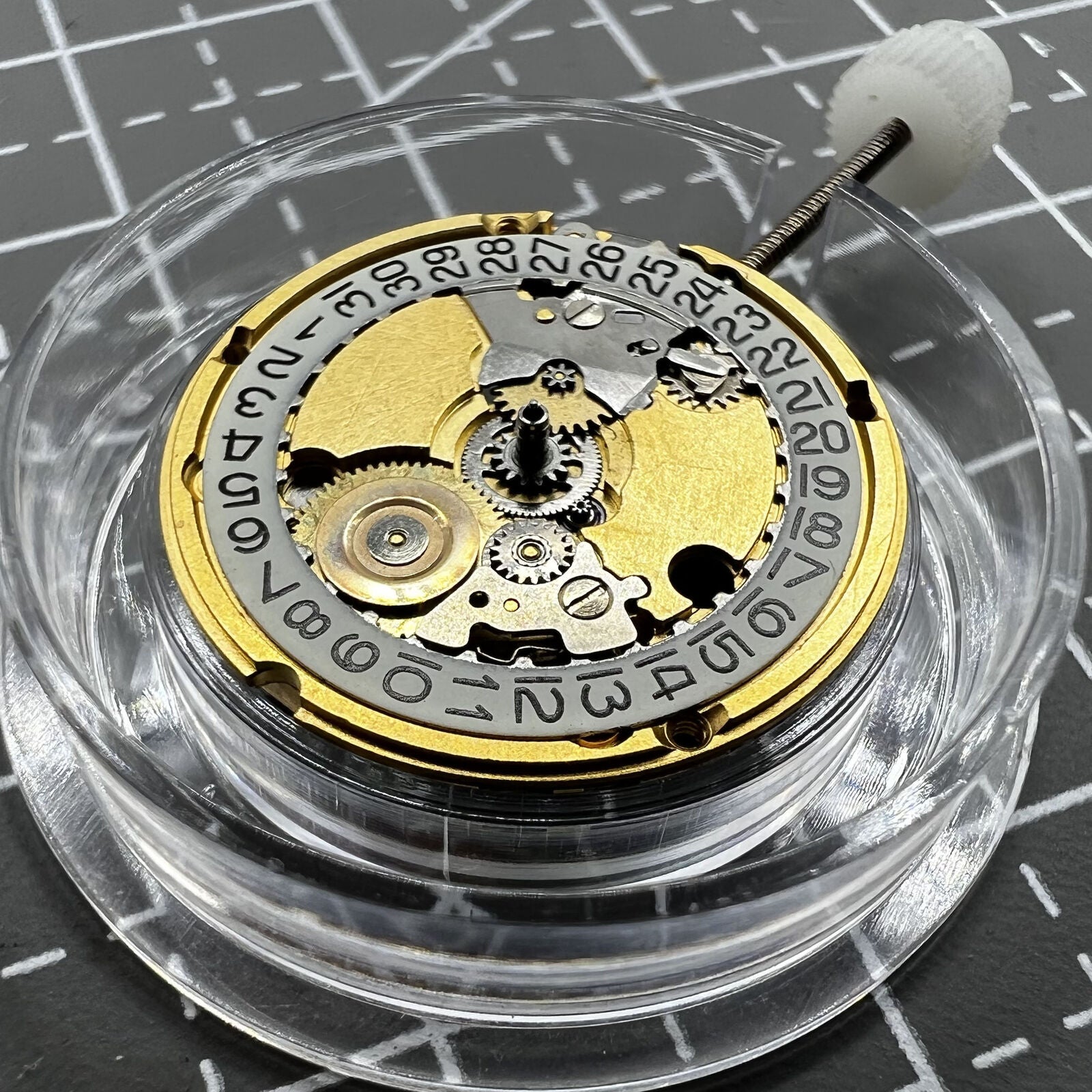Swiss ETA 956.112 quartz watch movement with three hands, date window at 3, precise and reliable timing