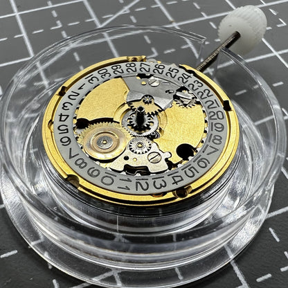 Swiss ETA 956.112 quartz watch movement with three hands, date window at 3, precise and reliable timing