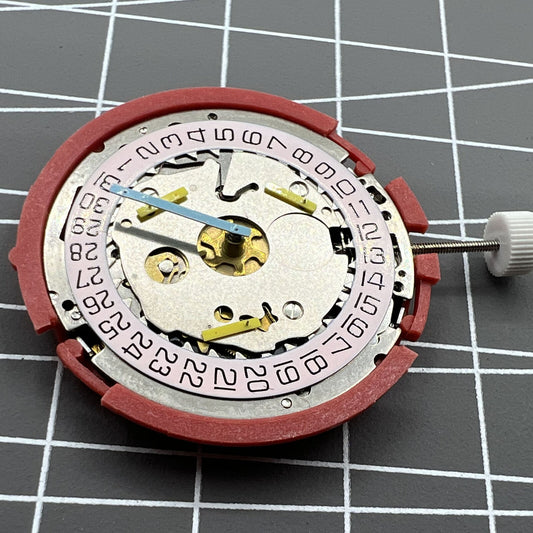 Swiss ISA 8181 quartz watch movement with single calendar, multifunction features for precise timekeeping.