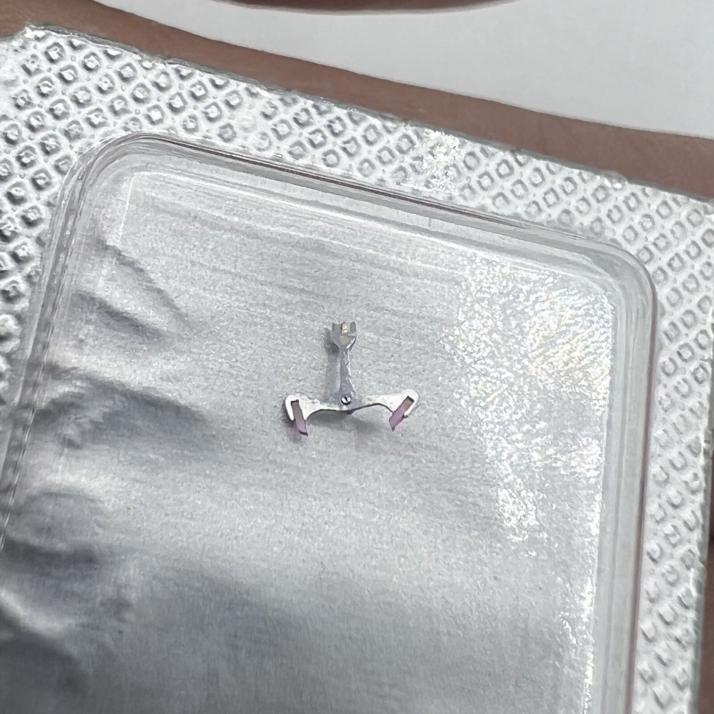 Silver metal pallet fork for C07.611 movement, Swiss Made brand precision watch part accessory.