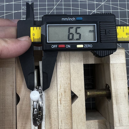 Chinese 4130 automatic watch movement featuring small second subdials at 3, 6, and 9 o'clock positions for precise timekeeping.