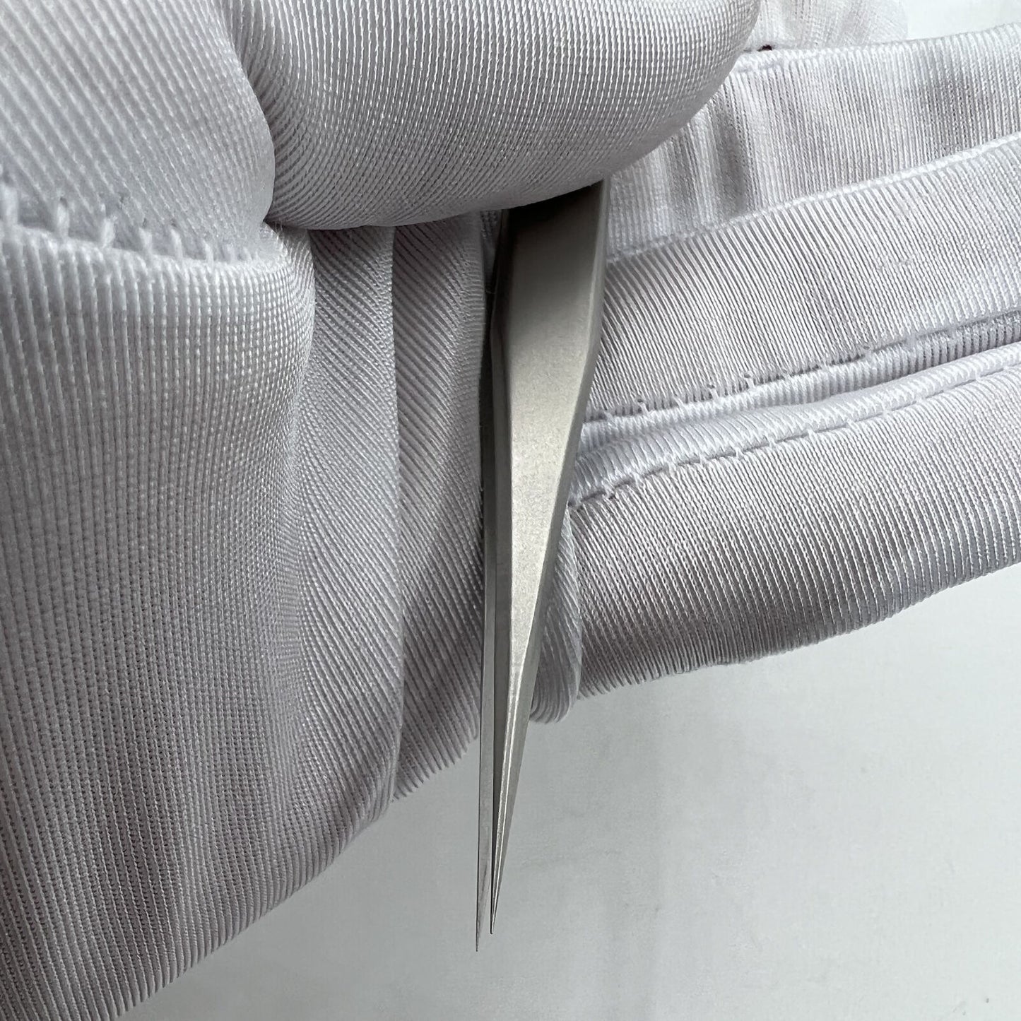 Swiss Bergeon antimagnetic tweezers model 7026-3 for precise watch repair and delicate hairspring handling.