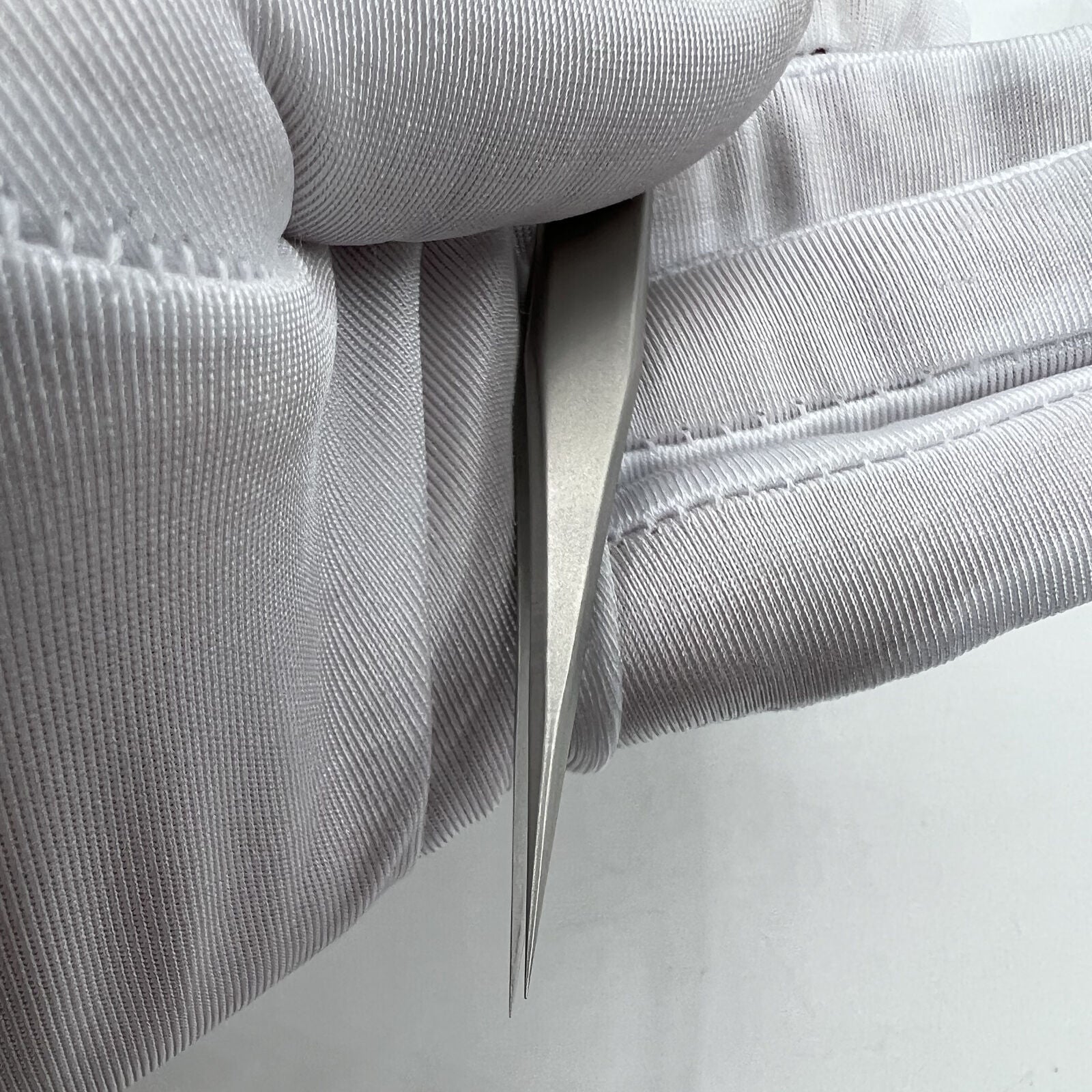 Swiss Bergeon antimagnetic tweezers model 7026-3 for precise watch repair and delicate hairspring handling.