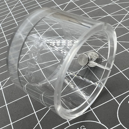 Transparent watch movement holder for RLX3135, secure and precise accessory.