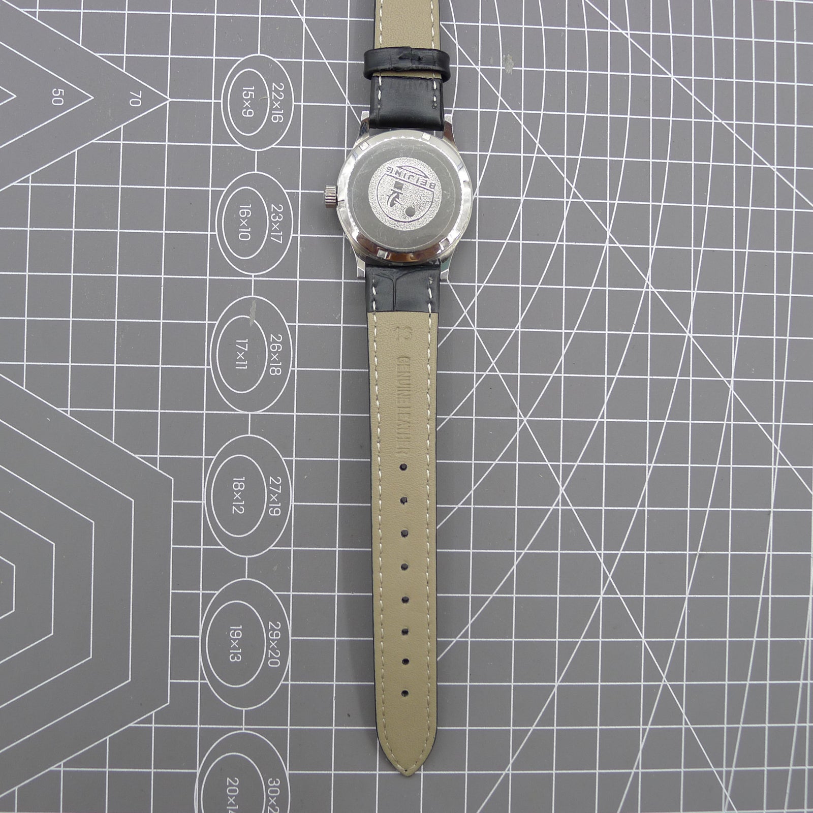 Beijing 31mm manual mechanical watch with silver case, double rhomb dial, showcasing classic Chinese craftsmanship.