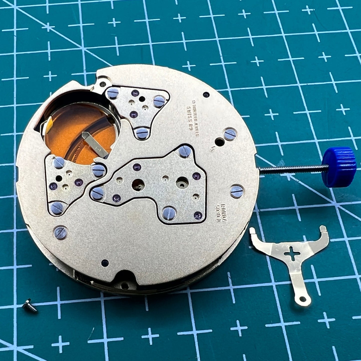 Swiss Made Ronda 5030D quartz watch movement with date display at 6, perfect for luxury watch repairs.