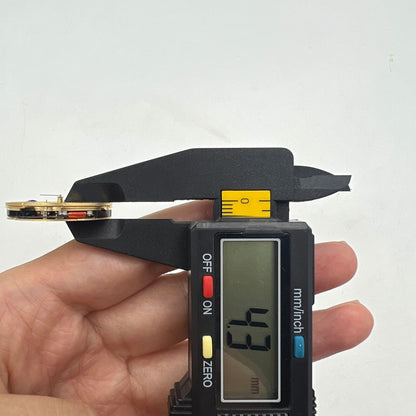 Ronda 5030D Swiss quartz movement with date at 6 o'clock, perfect for watch repair and accessories.