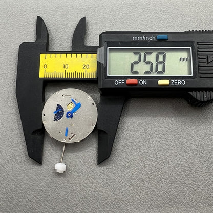 China Made 8205 automatic mechanical watch movement showing small seconds at 3, 6, and 9 o'clock positions for precise timekeeping.