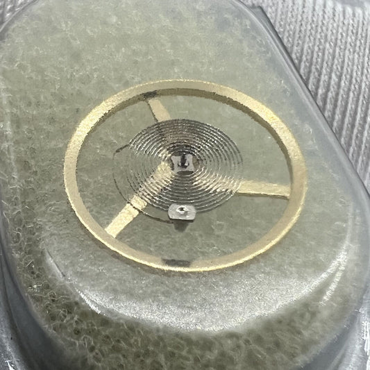 Balance wheel for ETA C01.211 movement, Swiss original watch part #6402, precision timing component.