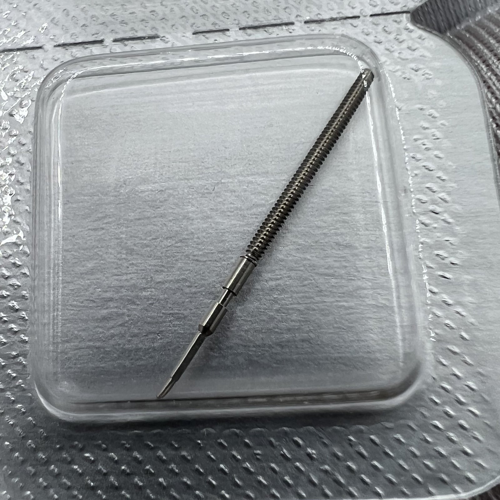 Precision-crafted watch winding stem for Swiss Made Ronda 1015 movement, ensuring reliable timekeeping.