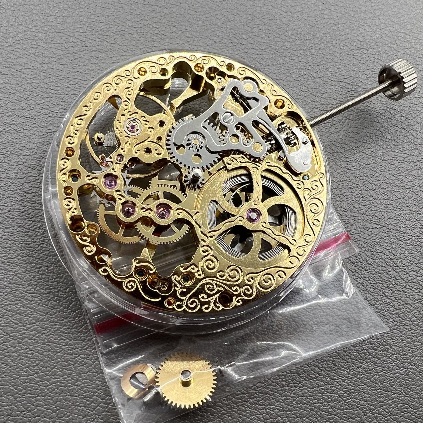 Golden Seagull ST3600 mechanical watch movement showcasing hollow design and 9 o?clock second hand detail.