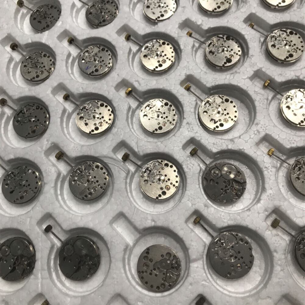 Set of 5 Chinese 7121 3121 automatic mechanical watch movements for precise repair practice.