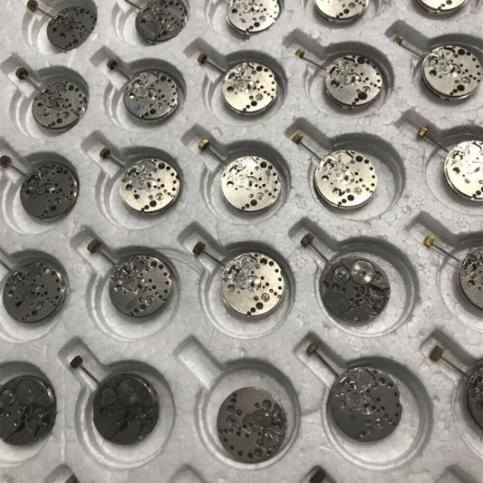 Set of 5 Chinese 7121 3121 automatic mechanical watch movements for precise repair practice.