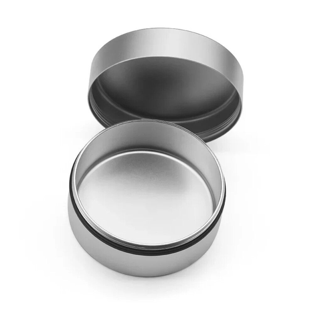 Steel and copper watch oil cylinder for precise watch repair and maintenance tasks.