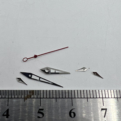 Green luminous watch hands with silver trim for ISA 9238 quartz movement, precise and durable.