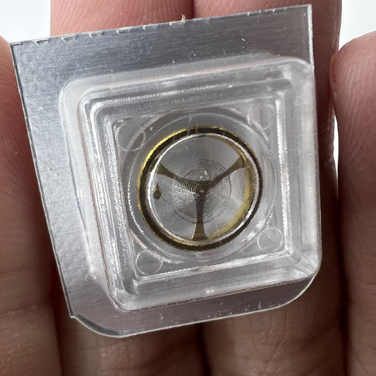 Golden complete balance wheel with hairspring for Orient 46941 46943 watch movement, precision component by Orient.
