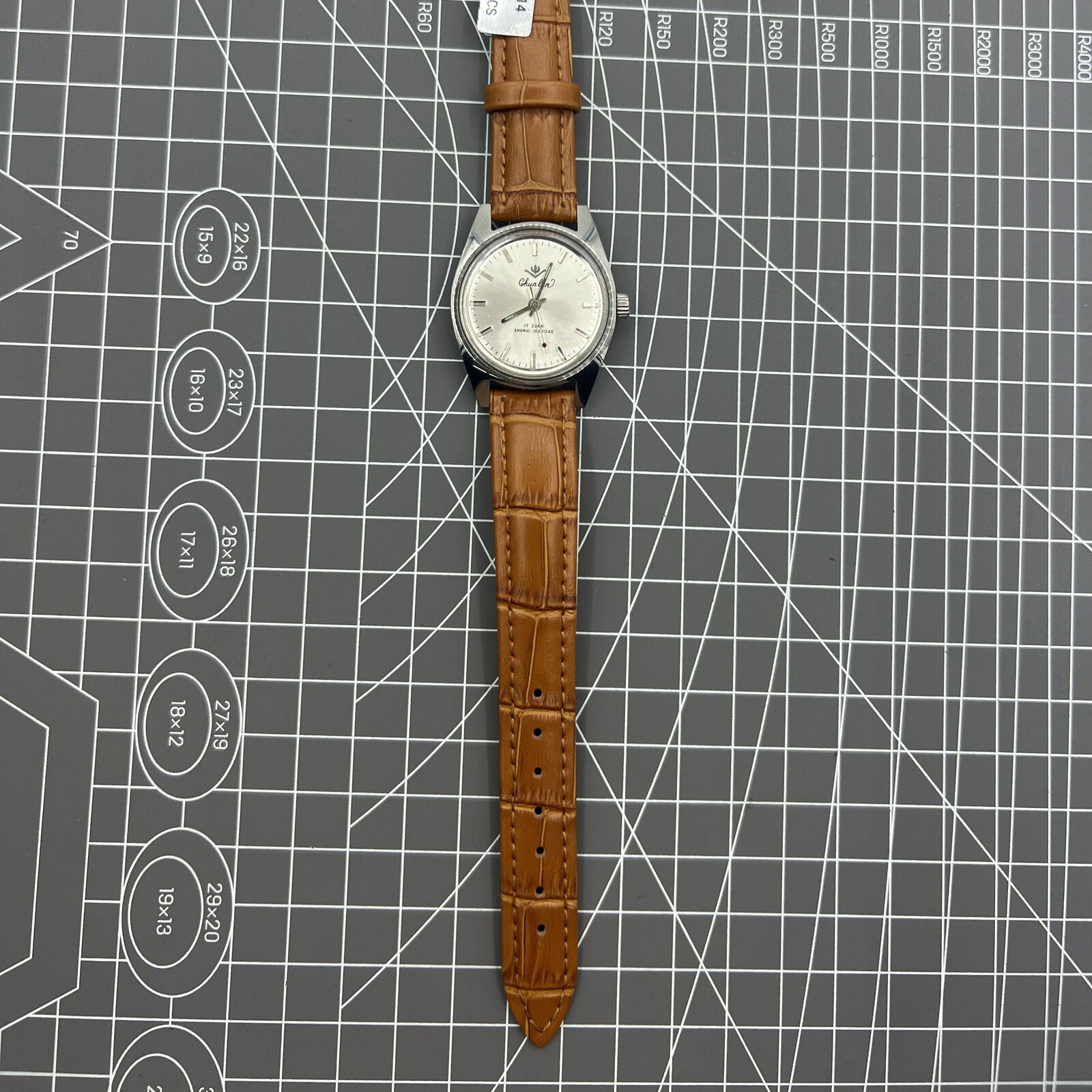 32mm Chunlan manual mechanical watch with silver dial and 17 jewel movement.