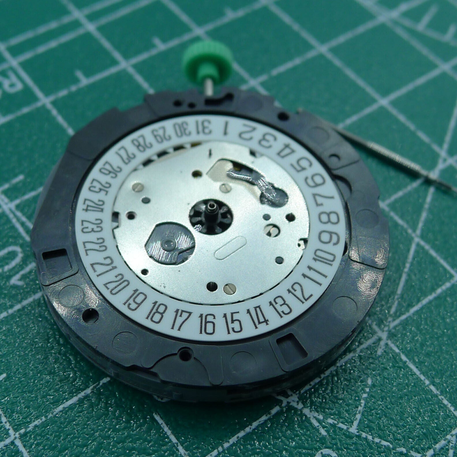 Miyota OS20 quartz watch movement by Japan Made, featuring precise timekeeping and date display at 6 o'clock.