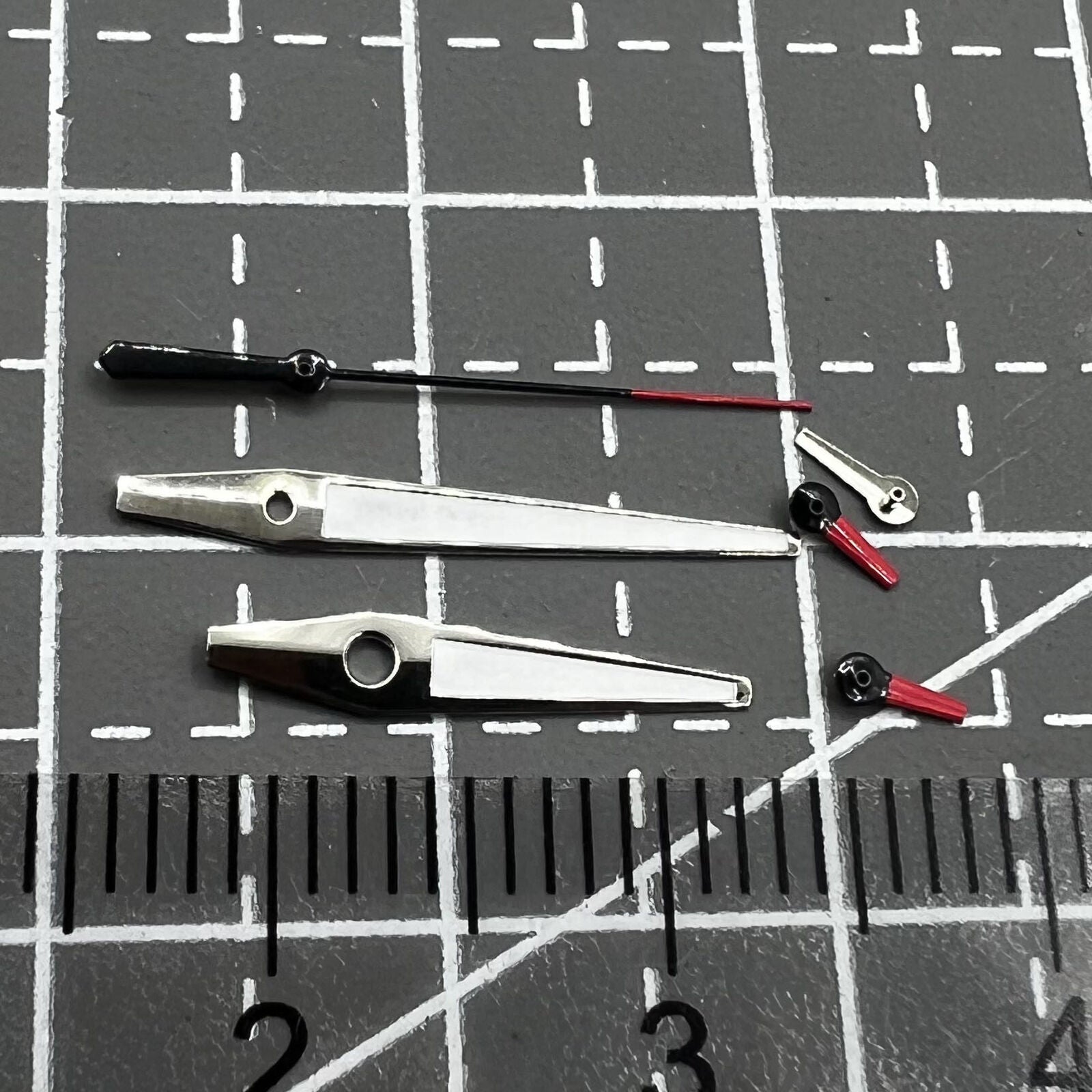Red and white small second watch hands with silver trim for Miyota OS series, precision accessory.