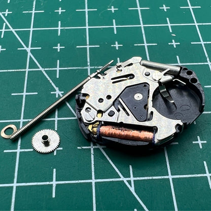 Hattori Epson VX50 quartz watch movement, Japan-made for precise, reliable watch repairs and replacements.