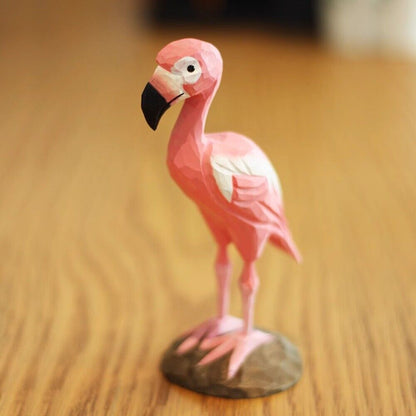 Handmade pink flamingo wooden figurine, charming decor for watch accessory display.
