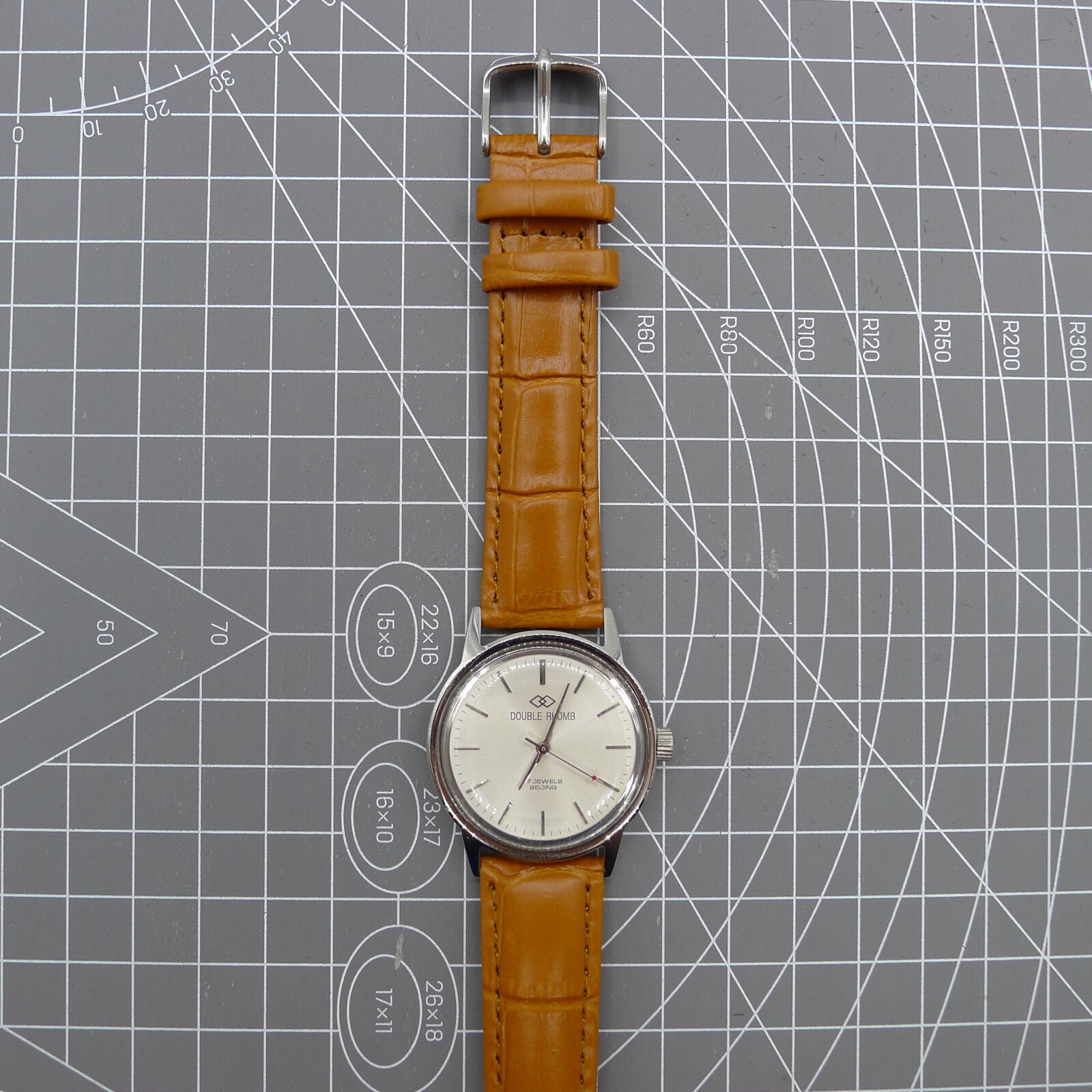 Beijing 36mm Double Rhomb watch with silver case and nail strap, manual mechanical movement for accuracy