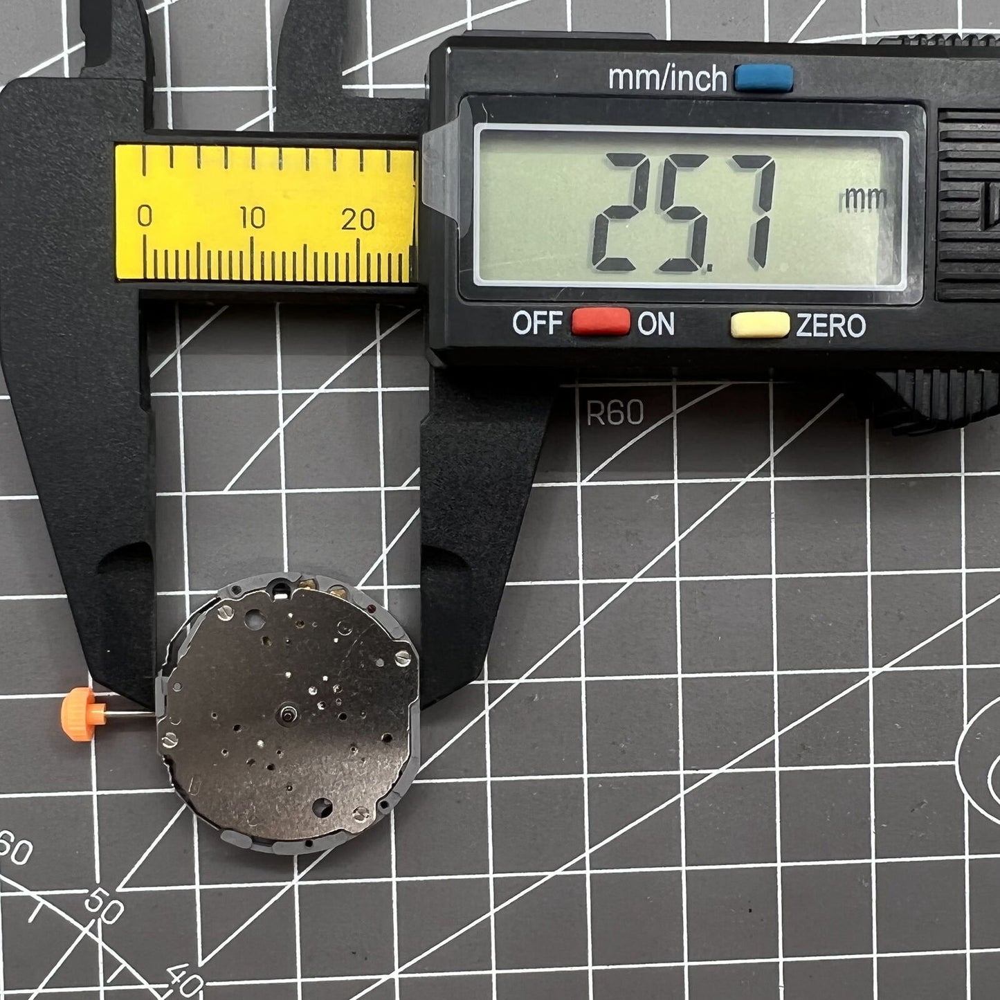 Japan Miyota JS10 quartz watch movement showing small second hand at 6 o?clock for precision timing.