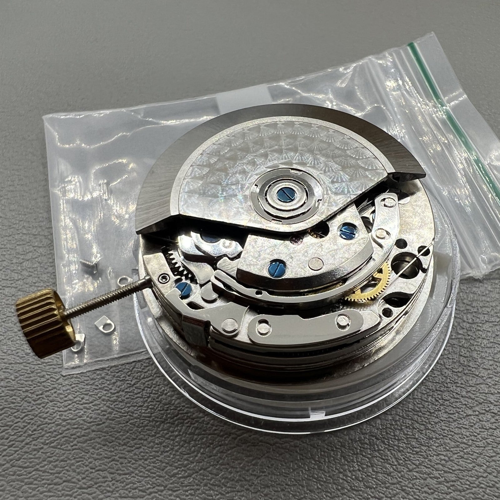Chronograph watch accessory by ETA featuring 7750 movement, white dial, calendar at 6, second hand at 9.