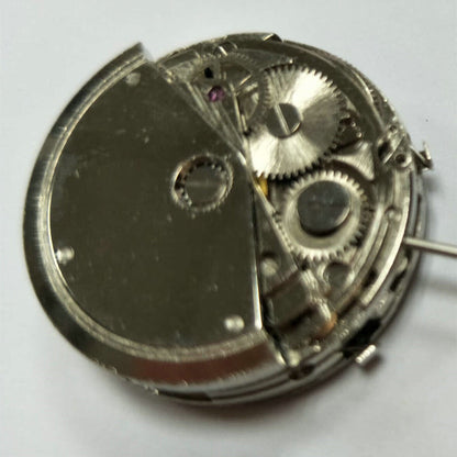 Shanghai watch accessory with China-made automatic movement, small second dials at 3 and 9 o'clock positions.