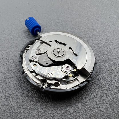 Seiko NH36 watch movement with white dial, bilingual Japanese-English day display, 3.8mm crown, reliable precision.