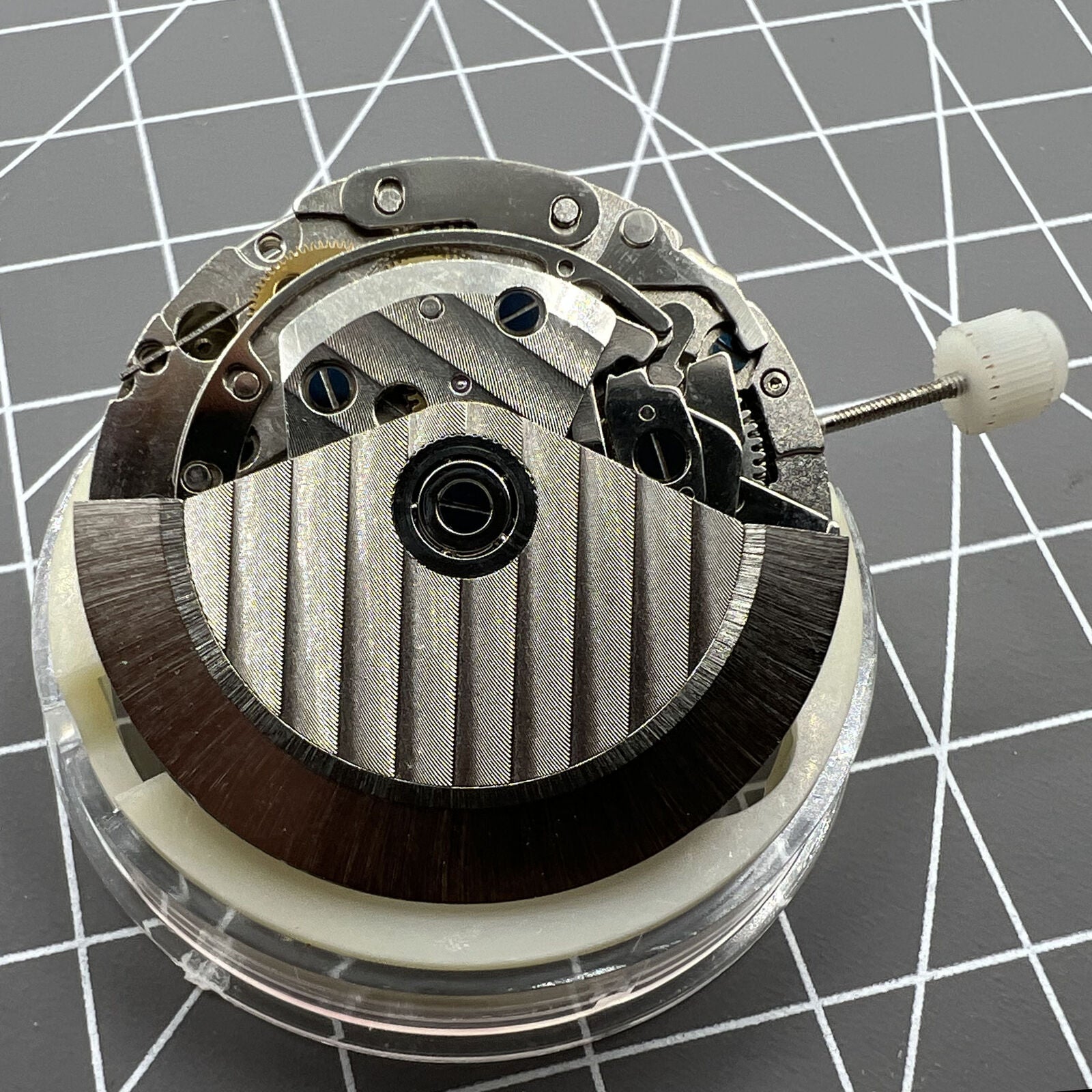 Close-up of Asian 7750 automatic chronograph watch movement featuring single calendar, precise ETA 7750 design.