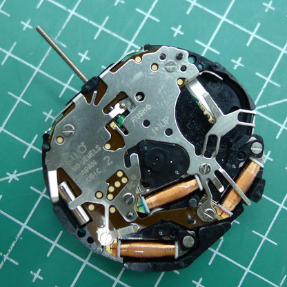 Hattori Epson VD51C quartz watch movement, Japan-made, precise timekeeping for watch repairs.