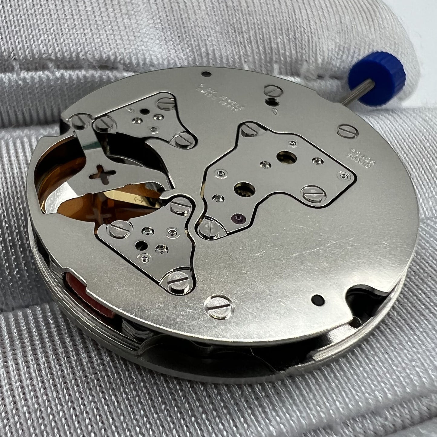 Swiss Ronda 5030D quartz watch movement with date at 4, precision Swiss parts by Ronda for reliable timekeeping.