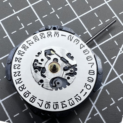 Seiko 7N32C Quartz watch movement showing three hands and single date at 3 o'clock for watch accessories.