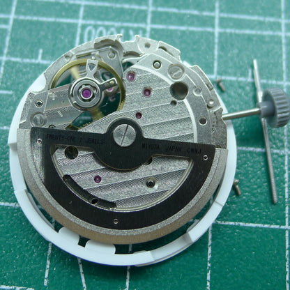 Japan Miyota 82S0 silver plated hollow automatic watch movement showcasing intricate mechanical design for accurate timekeeping.