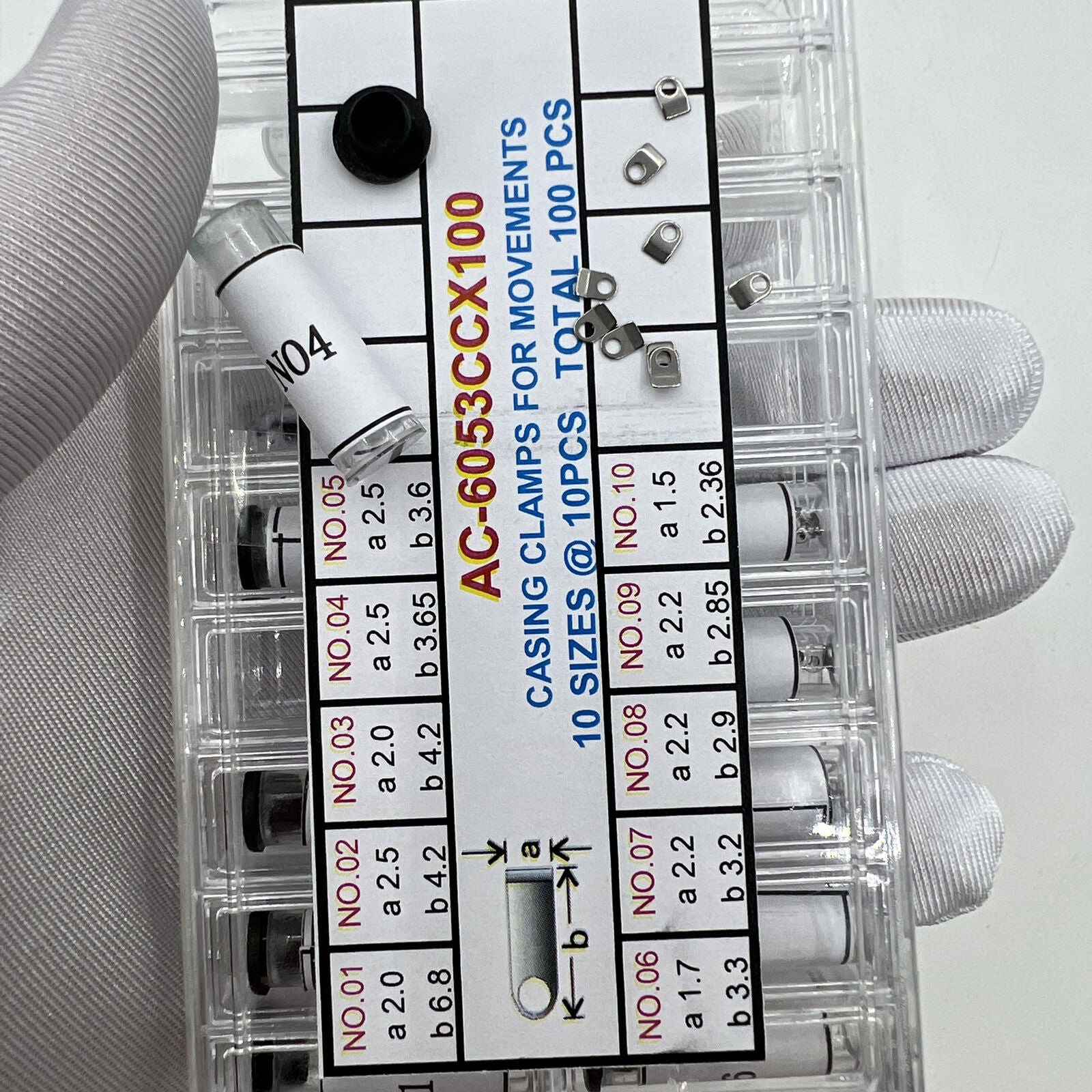 Casing clamps set, 10 sizes, 100pcs, precise fit for secure watch movement assembly.